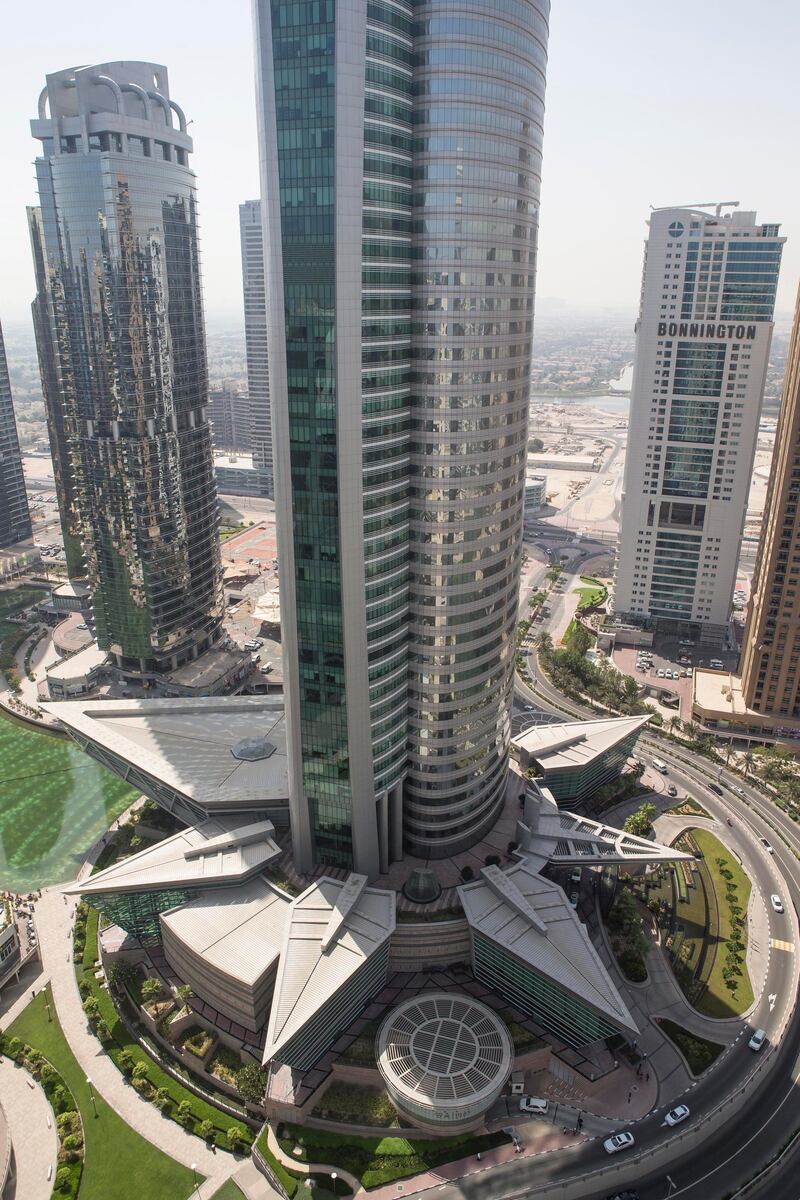 DUBAI, UNITED ARAB EMIRATES, 21  JUNE 2015. STOCK PHOTOGRAPHY of Almas Tower in Jumeirah Lakes, JLT. Apartments, Apartment, Rent, Rental, Dubai.  (Photo: Antonie Robertson/The National) Journalist: None. Section: National. *** Local Caption ***  AR_2106_Property_Stock-11.JPG