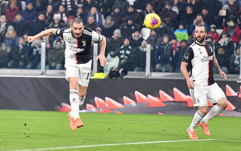 Leonardo Bonucci, left, makes it 3-0. EPA