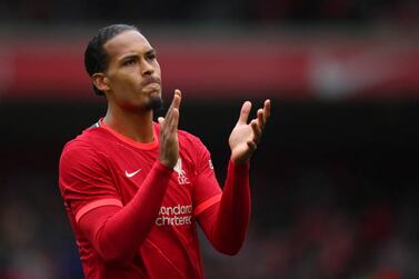 LIVERPOOL, ENGLAND - AUGUST 08: Virgil Van Dijk of Liverpool applauds during the Pre-Season Friendly fixture between Liverpool and Athletic Club at Anfield on August 8, 2021 in Liverpool, England. (Photo by Robbie Jay Barratt - AMA / Getty Images)