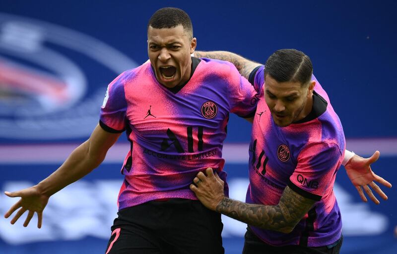 Paris Saint-Germain's Kylian Mbappe and Mauro Icardi celebrate a goal. AFP