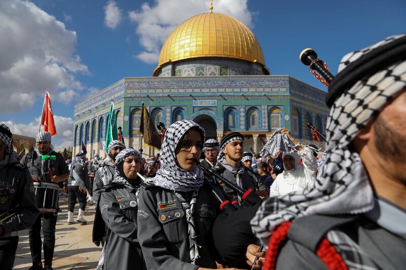 Palestinian scouts play music during celebrations marking the birthday of the Prophet Mohammed, in Al Aqsa Mosque compound in the Old City of Jerusalem on Tuesday. AP