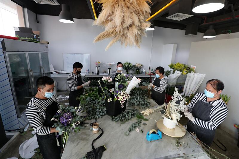 Dubai, United Arab Emirates - Reporter: N/A. Coronavirus/Covid-19. Florists at Florette prepare flowers and bouquets for delivery with Covid-19 prevention measures in place. Tuesday, August 18th, 2020. Dubai. Chris Whiteoak / The National