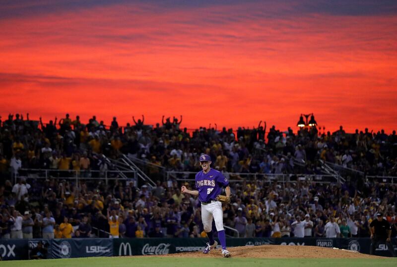 LSU pitcher Devin Fontenot ) reacts after striking out the final Florida State batter in the ninth inning of Game 2 of the NCAA college baseball super regional tournament in Baton Rouge, Louisiana. AP Photo