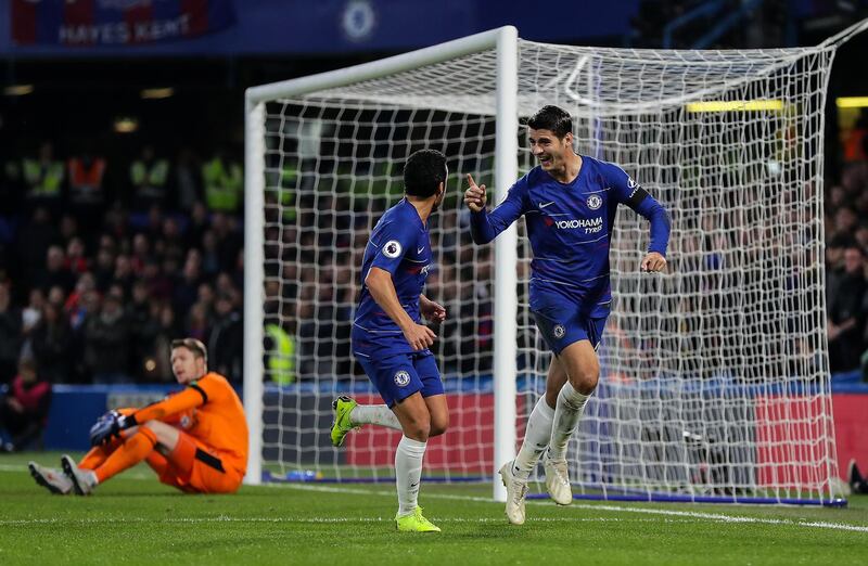 LONDON, ENGLAND - NOVEMBER 04: Alvaro Morata of Chelsea celebrates with teammate Pedro after scoring his team's first goal during the Premier League match between Chelsea FC and Crystal Palace at Stamford Bridge on November 04, 2018 in London, United Kingdom. (Photo by Richard Heathcote/Getty Images)