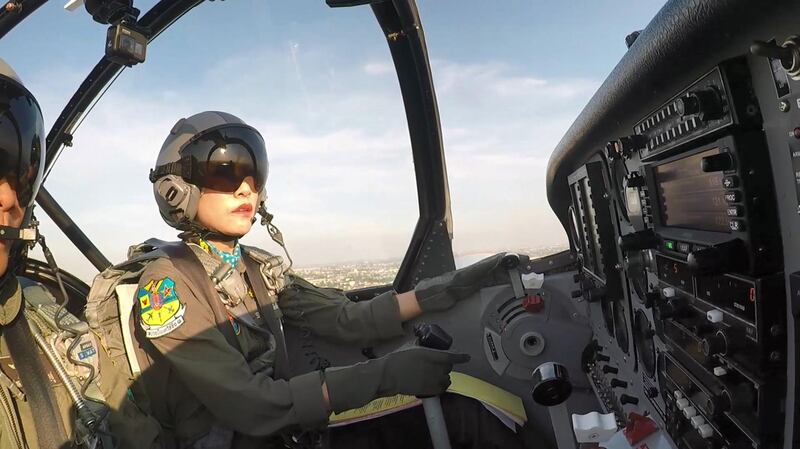 Thai royal consort Sineenat flies a plane, in an image released by the royal palace of Thailand in August. EPA