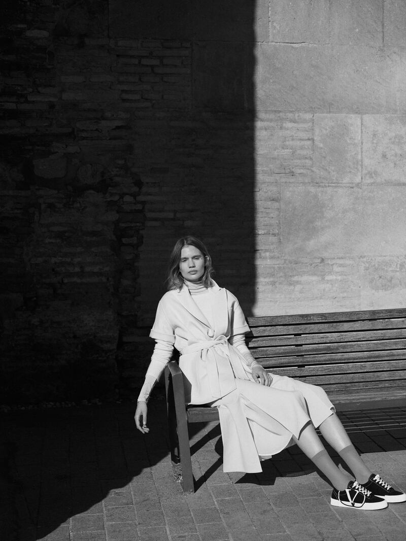 OUT OF SHADOWS.
Photography | Ezra Patchett | fashion director | Sarah Maisey

Jumper, Dh1,995; coat, Dh5,800; and skirt, Dh2,290, all from Max Mara. Trainers, Dh2,360, Valentino. Socks, stylist’s own