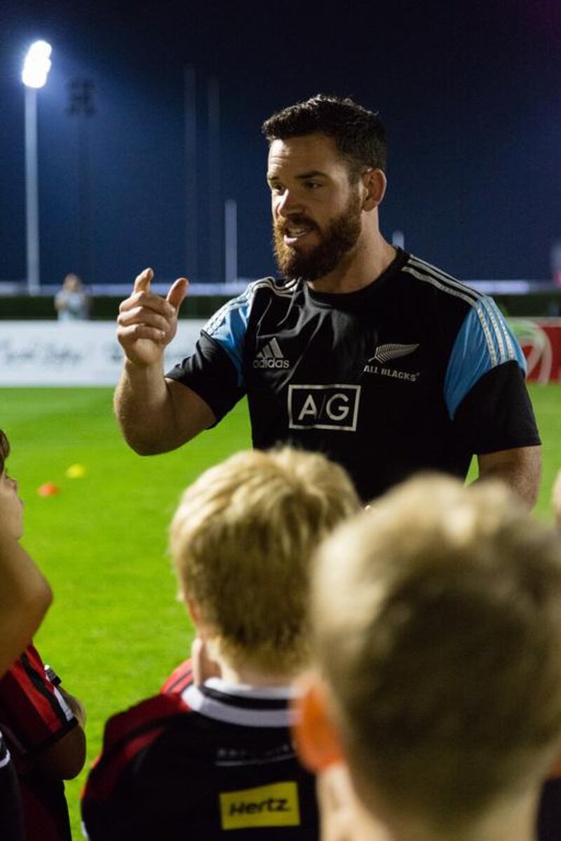 Crotty coaches up the juniors at Dubai Sevens Ground. Duncan Chard for The National