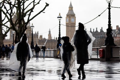 Heavy rain falls on the Houses of Parliament. But will it rain on the Conservatives when the voters have their say? EPA