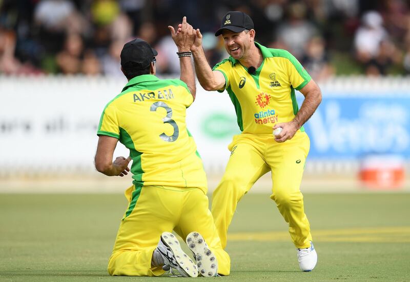 Ricky Ponting congratulates Wasim Akram during the Bushfire Cricket Bash match in Melbourne. Getty Images