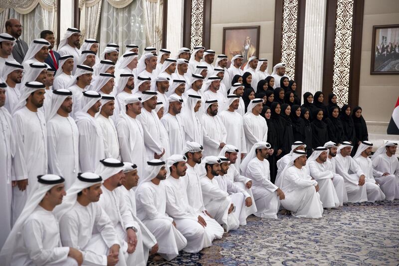 ABU DHABI, UNITED ARAB EMIRATES - May 28, 2019: HE Dr Ahmed Mubarak Al Mazrouei, Secretary General of the Abu Dhabi Executive Council (2nd row 5th L), HE Humaid bin Saeed Al Neyadi, Deputy Director of the Office of the UAE Minister of Presidential Affairs (2nd row 6th L), HE Hamad Abdul Rahman Al Madfa, Secretary General of the Supreme Council of the Union Affairs in the Ministry of Presidential Affairs (2nd row 7th L), HE Ahmed Mohamed Al Humairi, the Secretary-General of the Ministry of Presidential Affairs (2nd row 8th L), HE Ahmed Juma Al Zaabi, UAE Deputy Minister of Presidential Affairs (2nd row 9th L), HH Sheikh Tahnoon bin Mohamed Al Nahyan, Ruler's Representative in Al Ain Region (2nd row 10th L), HH Sheikh Mohamed bin Zayed Al Nahyan, Crown Prince of Abu Dhabi and Deputy Supreme Commander of the UAE Armed Forces (2nd row 11th L) and HH Sheikh Mansour bin Zayed Al Nahyan, UAE Deputy Prime Minister and Minister of Presidential Affairs (2nd row 12th L), stand for a photograph with members of Ministry of Presidential Affairs, during an iftar reception at Al Bateen Palace.

( Hamad Al Mansouri for the Ministry of Presidential Affairs )
---