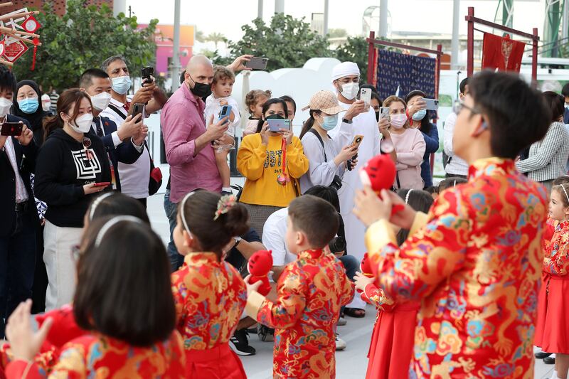 Crowds enjoy the Lunar New Year show at Expo 2020 Dubai. Pawan Singh / The National