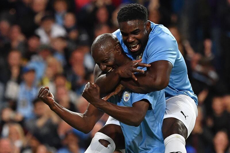 Manchester City Legend's Benjani celebrates scoring his team's second goal. Reuters