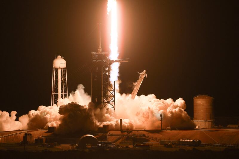 The rocket lifts off from launch pad. AFP