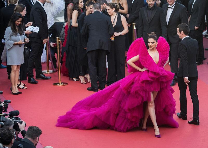 Bollywood star Deepika Padukone made a bold statement in this inspired-by-the-80s Ashi Studio design. The Cannes red carpet is very go-big-or-go-home, and she certainly delivered. AFP