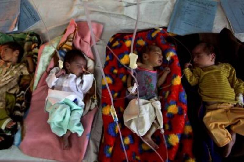 Newly-born babies sleep at a hospital in Jammu, India, Thursday, March 31, 2011. India is now home to 17 percent of all people in the world as its population climbed to 1.21 billion in 2011, though growth actually slowed for the first time in 90 years, census officials said Thursday. (AP Photo/Channi Anand) *** Local Caption ***  DEL104_India_New_Census.jpg