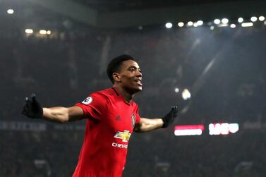 MANCHESTER, ENGLAND - DECEMBER 26: Anthony Martial of Manchester United celebrates scoring his team's fourth goal during the Premier League match between Manchester United and Newcastle United at Old Trafford on December 26, 2019 in Manchester, United Kingdom. (Photo by Ian MacNicol/Getty Images)