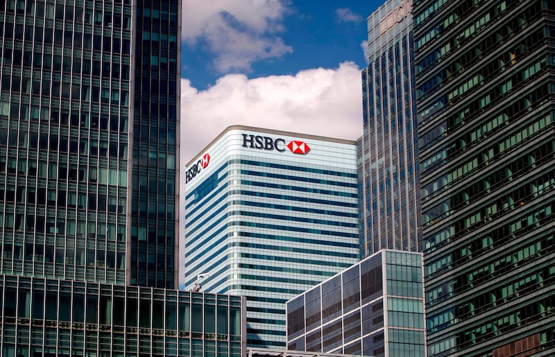 (FILES) In this file photo taken on July 31, 2018, the HSBC UK headquarters is seen at the Canary Wharf financial district of London on July 31, 2018. HSBC has agreed to pay $765 million to resolve allegations it passed on toxic mortgage securities to investors prior to the global financial crisis, federal prosecutors announced October 9, 2018. Between 2005 and 2007, HSBC staff knowingly packaged low-grade loan pools with high rates of default into mortgage-backed securities, despite warnings from its internal risk management team and outside reviewers, according to the US Attorney's Office in Colorado. / AFP / Tolga Akmen
