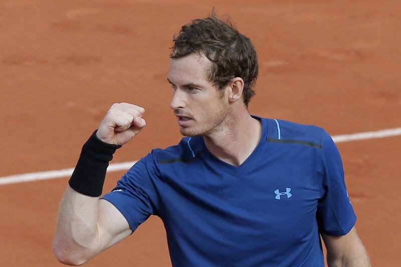 Andy Murray pumps his fist after winning his French Open first round match against Andrey Kuznetsov. Michel Euler / AP Photo