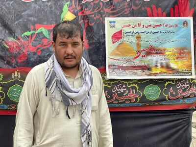 Mohammad Jan stands outside a traditional tent known as a takyakhana, in which Afghan Shiites serve food and drink during the commemoration of Ashura. Hikmat Noori for The National