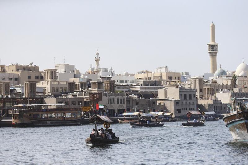 For many people Deira and the creek, the Khor Dubai, with its dhow moorings, abra water taxis, and souks is the very essence of the old city. Sarah Dea / The National