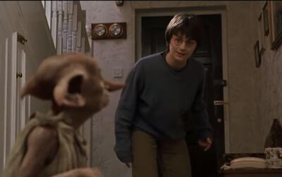 Harry Potter and Dobby the house elf in a scene from Harry Potter and the Chamber of Secrets.