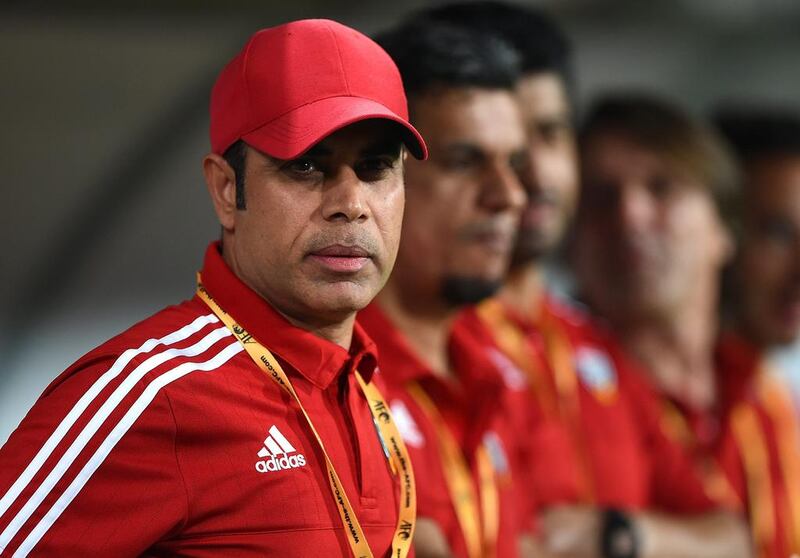 UAE manager Mahdi Ali looks on during the match. Tom Dulat / Getty Images