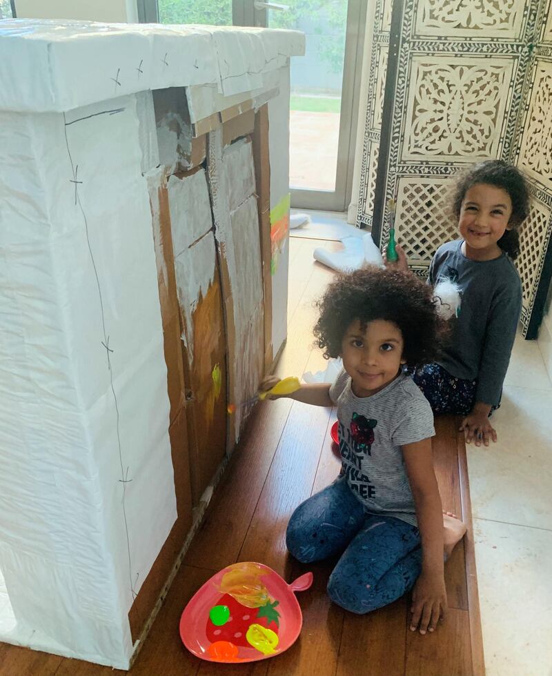 Daughters Reya and Arya helped with the making of the fireplace.