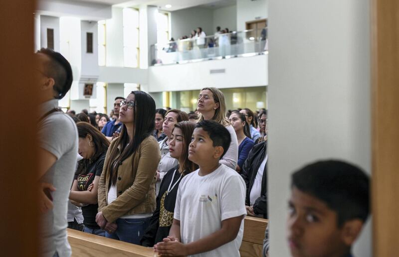 Abu Dhabi, United Arab Emirates - Worshippers view the historic Papal mass at St. JosephÕs Cathedral on February 5, 2019. Khushnum Bhandari for The National