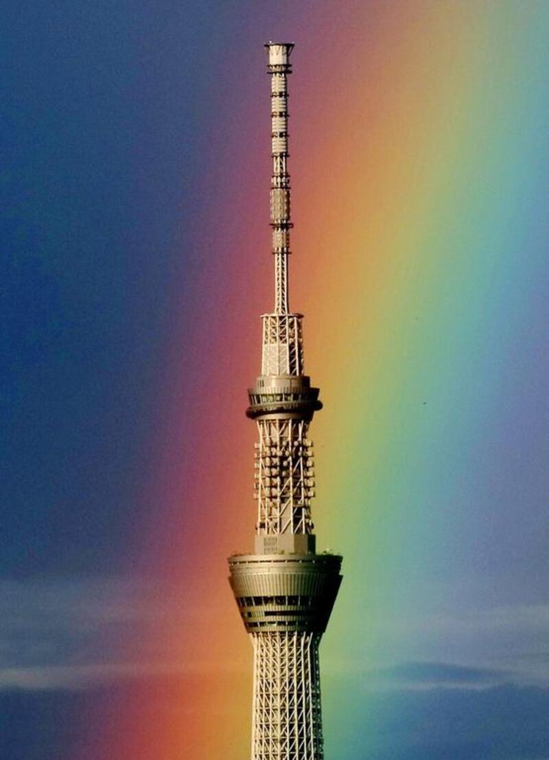 A rainbow is seen behind the world's tallest radio tower "Tokyo Skytree". Jiji Press / AFP Photo