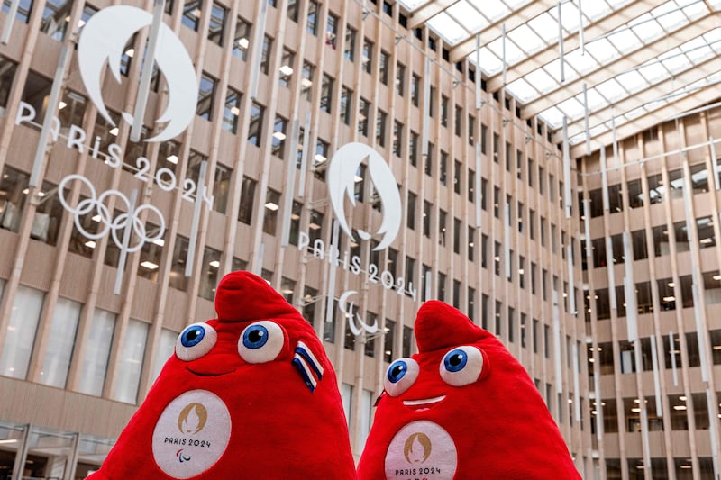 Two official Olympic 'Phryges' mascots on parade at the headquarters of the Paris 2024 Olympic and Paralympic Organising Committee. AFP