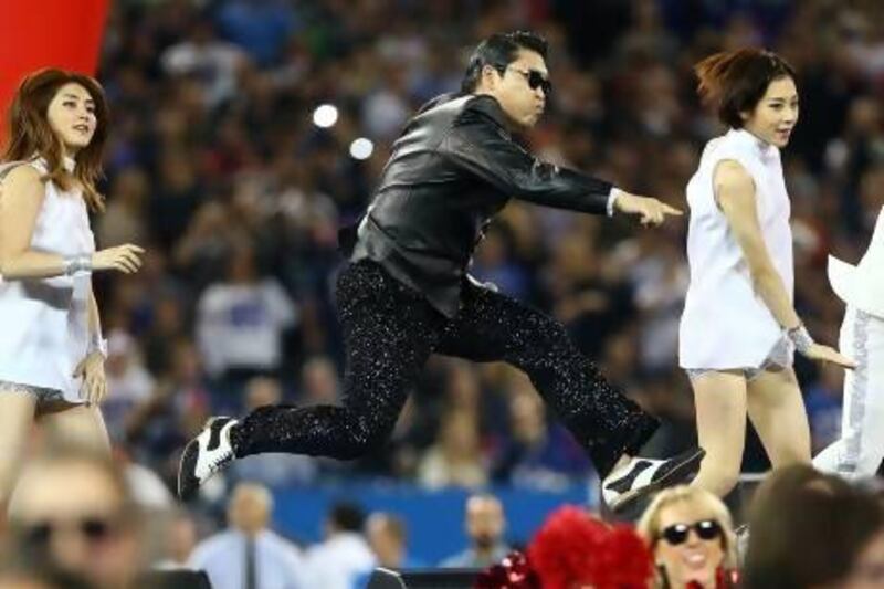 Psy performs at halftime during the Seattle Seahawks NFL game against the Buffalo Bills at Rogers Centre in Toronto, Ontario, Canada. Tom Szczerbowski / Getty Images / AFP