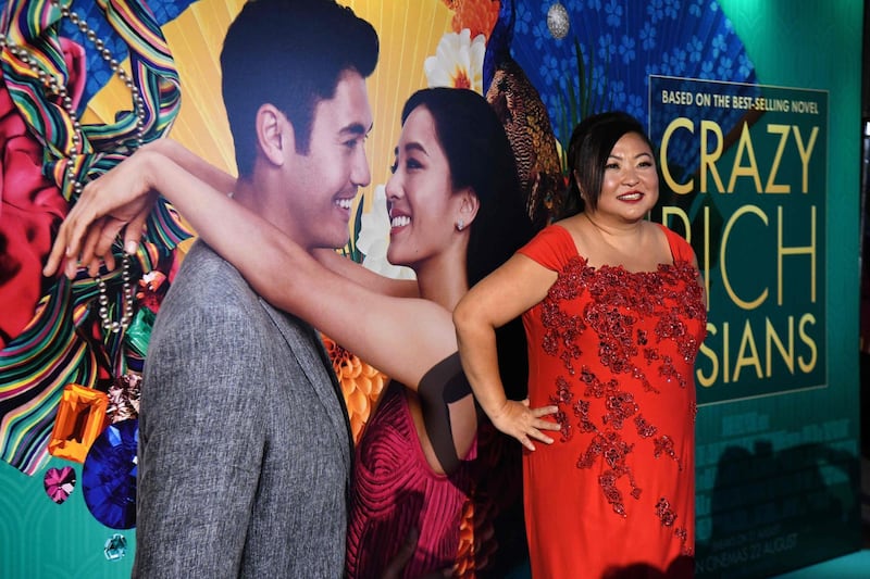 Singaporean performer Selena Tan posing at the premiere of the film 'Crazy Rich Asians' at the Capitol Theatre in Singapore. Roslan Rahman / AFP