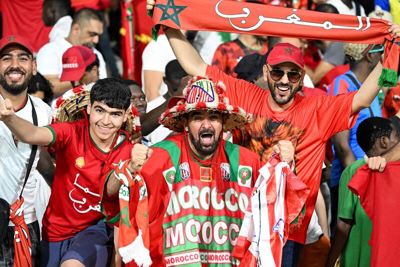 Morocco supporters cheer on their team inside the Stade Laurent Pokou. AFP