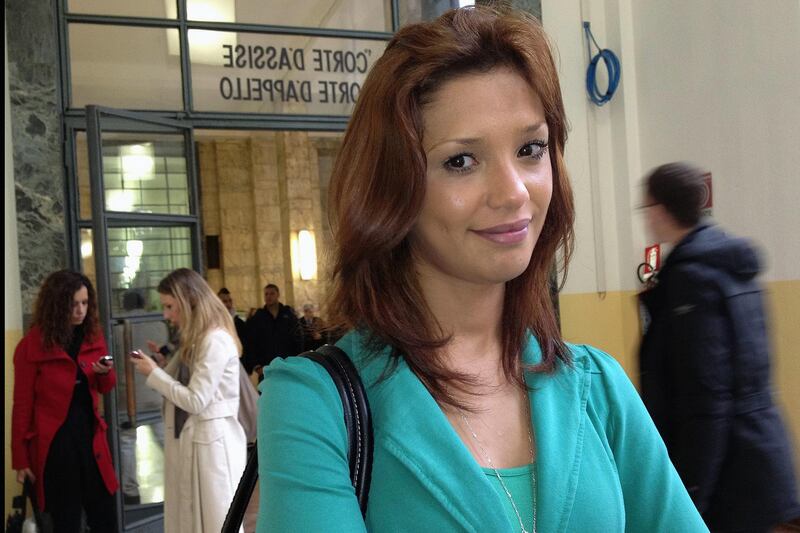 (FILES) In this file photo taken on April 16, 2012, Moroccan model Imane Fadil arrives at Milan's court during the trial of the ex-premier Silvio Berlusconi for allegedly having sex with an underage prostitute.  Italian newspapers reported on March 16, 2019 that the March 1 2019 death of ex-model Imane Fadil, a witness in trials against Silvio Berlusconi's "bunga bunga" parties, may have been caused by poisoning with radioactive substances. Fadil, 33, died a month after being admitted to a Milan hospital with severe stomach pains. / AFP / Olivier MORIN
