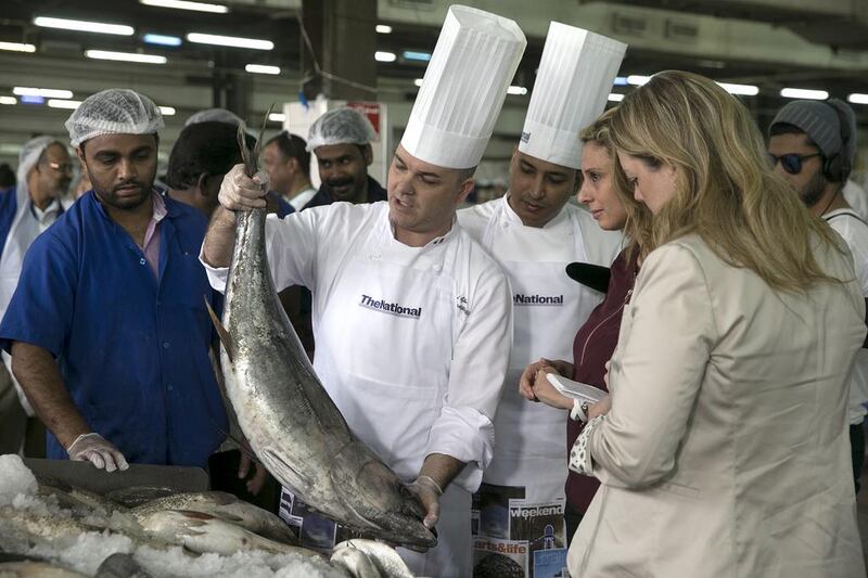 Pascal Sfara chooses a tuna for lunch. Silvia Razgova / The National