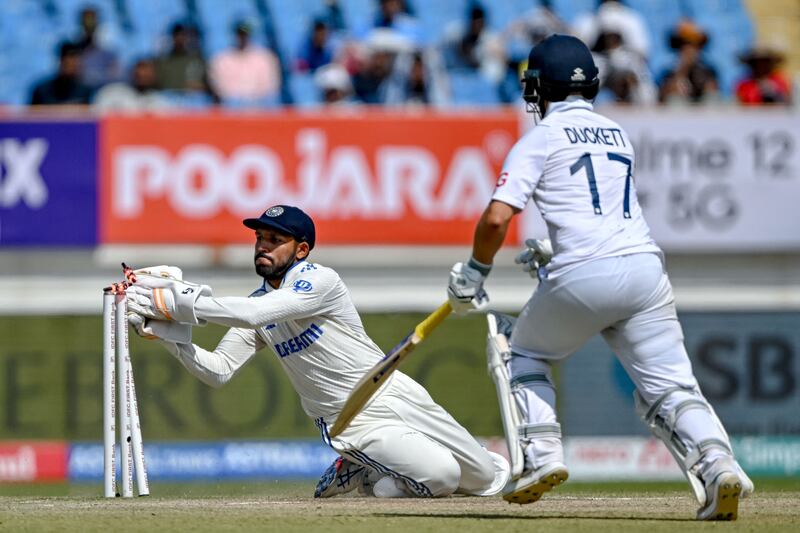 India wicketkeeper Dhruv Jurel runs out England's Ben Duckett for 11. AFP