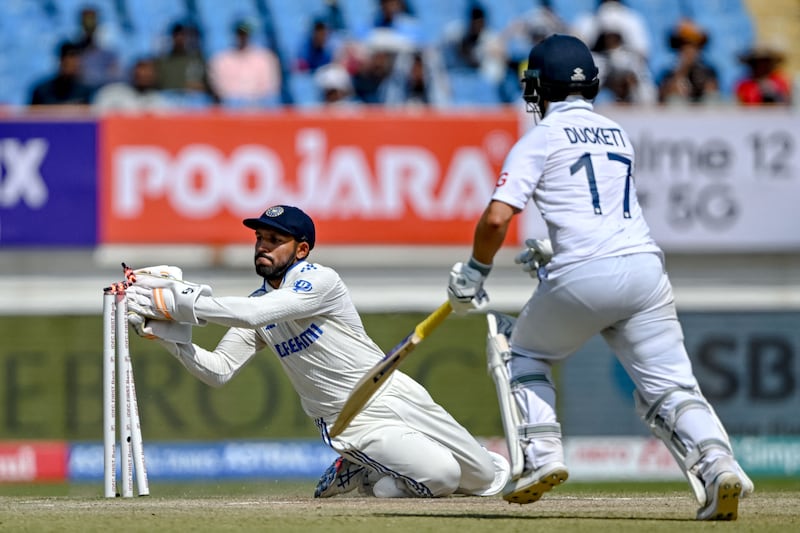India wicketkeeper Dhruv Jurel runs out England's Ben Duckett for 11. AFP