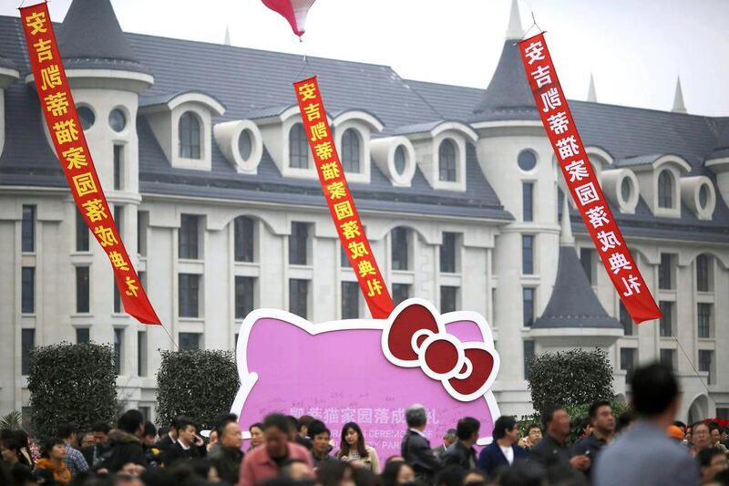 Guests attend the inauguration ceremony of first Hello Kitty amusement park outside Japan. Carlos Barria / Reuters