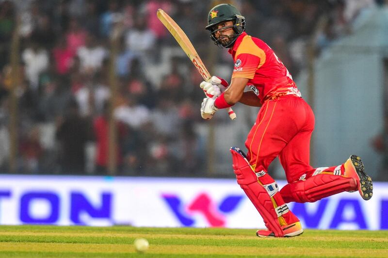 Zimbabwe cricketer Sikandar Raza plays a shot during the second one day international (ODI) cricket match between Bangladesh and Zimbabwe at the Zahur Ahmed Chowdhury Stadium in Chittagong on October 24, 2018. (Photo by MUNIR UZ ZAMAN / AFP)