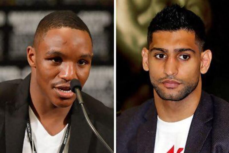 IBF Welterweight champion Devon Alexander, left, said on Twitter he is awaiting Amir Khan to sign a contract to fight him, something the Briton denies. Ethan Miller, Scott Heavey / Getty Images