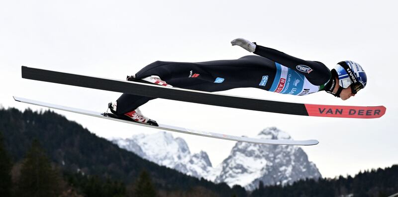 Germany's Andreas Wellinger soars during a training jump for the second stage of the Four-Hills tournament that is part of the FIS Ski Jumping World Cup, in Garmisch-Partenkirchen, southern Germany. AFP