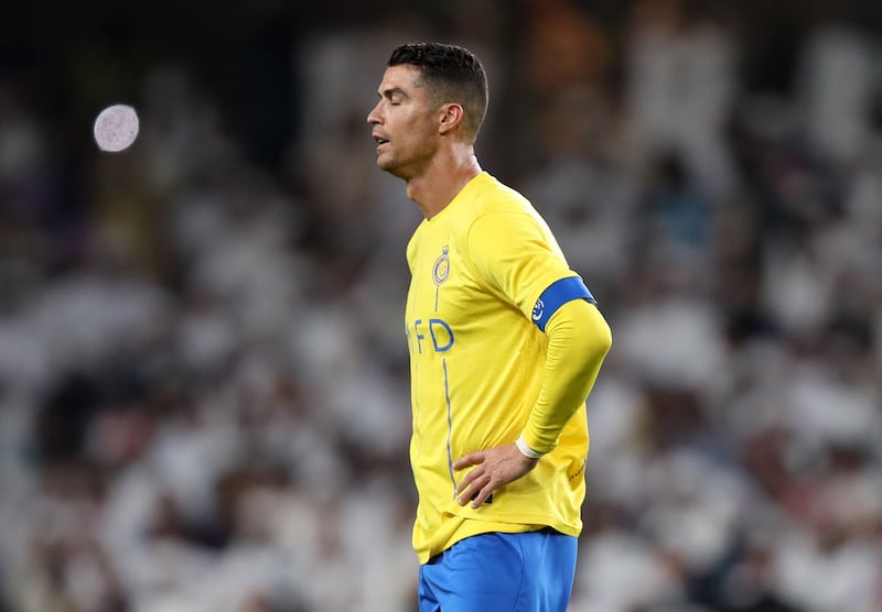 Al Nassr's Cristiano Ronaldo looks dejected.
