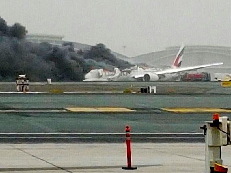 This image shows an Emirates aircraft on fire at Dubai Airport. Emirates has confirmed that an incident happened at Dubai International Airport on August.