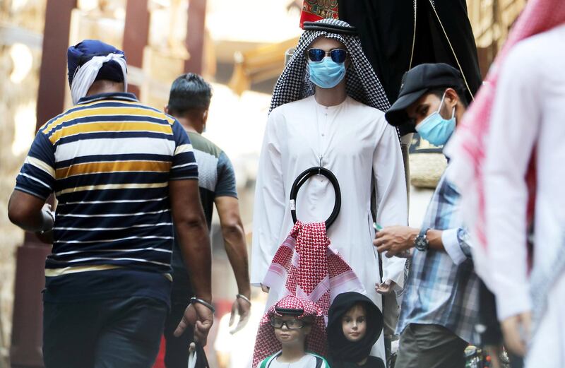 DUBAI, UNITED ARAB EMIRATES , October 9 – 2020 :- People wearing protective face mask as a preventive measure against the spread of coronavirus in Bur Dubai area in Dubai. (Pawan Singh / The National) For News/Stock/Online.