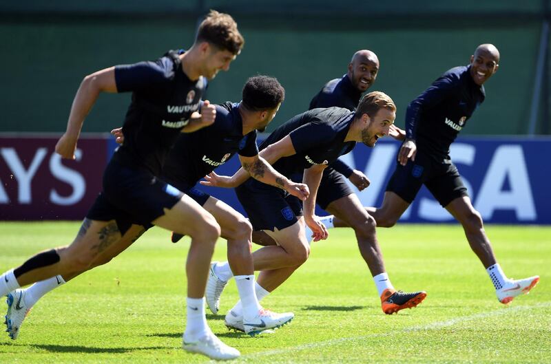 England's forward Harry Kane, centre, takes part in a training session in Repino on June 27. Paul Ellis / AFP
