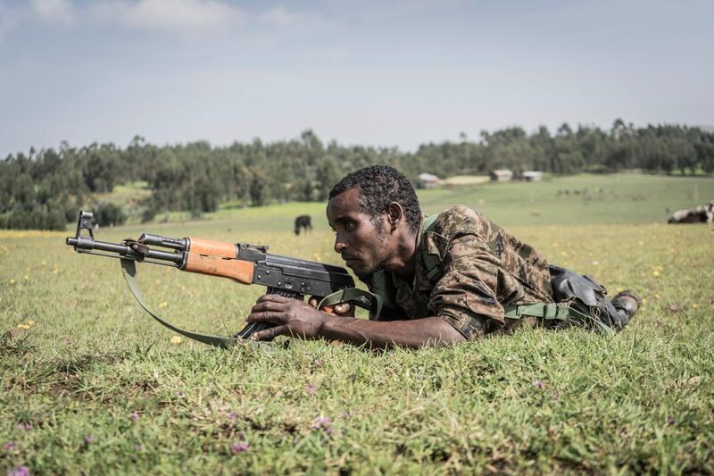 Ethiopian soldiers train in the field. AFP