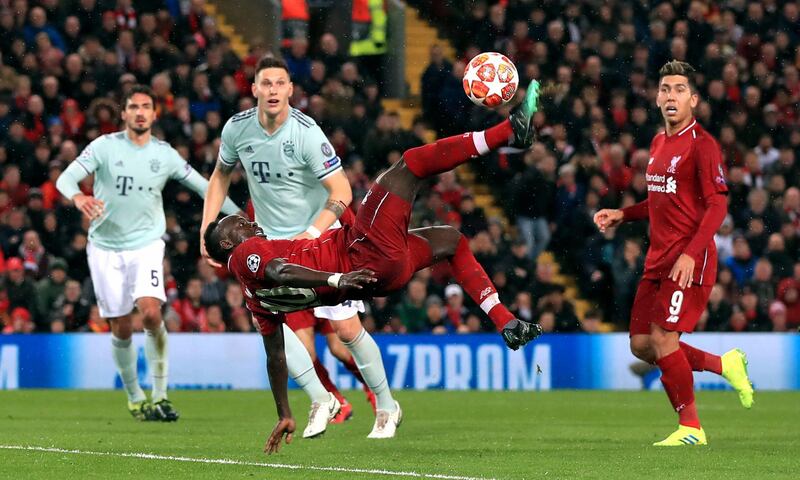 Liverpool's Sadio Mane attempts an overhead kick, during the Champions League round of 16 first leg soccer match between Liverpool and Bayern Munich,  at Anfield, in Liverpool, England, Tuesday, Feb. 19, 2019. (Peter Byrne/PA via AP)