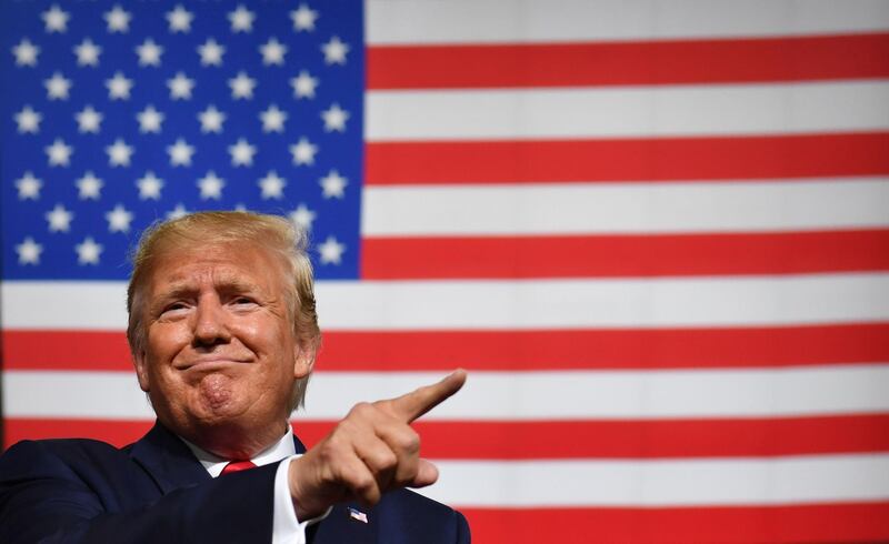 TOPSHOT - US President Donald Trump speaks during a "Keep America Great" campaign rally at the SNHU Arena in Manchester, New Hampshire, on August 15, 2019. ALTERNATIVE CROP 
 / AFP / Nicholas Kamm / ALTERNATIVE CROP 
