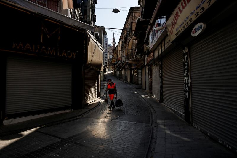 A municipality worker sweeps a street at Eminonu district in Istanbul. Reuters