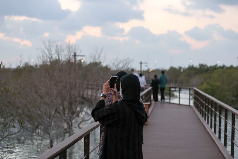 Residents spend time at Jubail Mangrove Park, Abu Dhabi. Khushnum Bhandari / The National